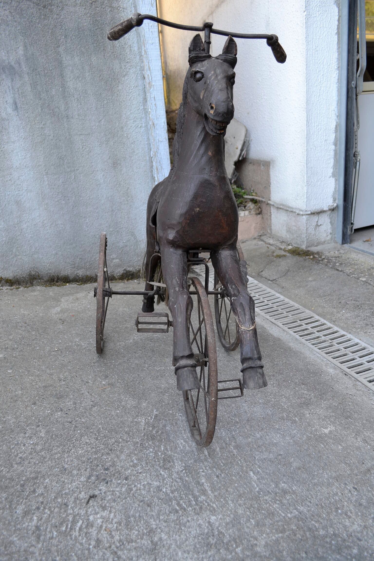 Wooden horse tricycle