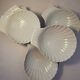 10 small dishes / ramekins / shell-shaped cups. French porcelain
