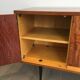 Designer sideboard with 4 doors in sapele mahogany and sycamore on a blackened wood base