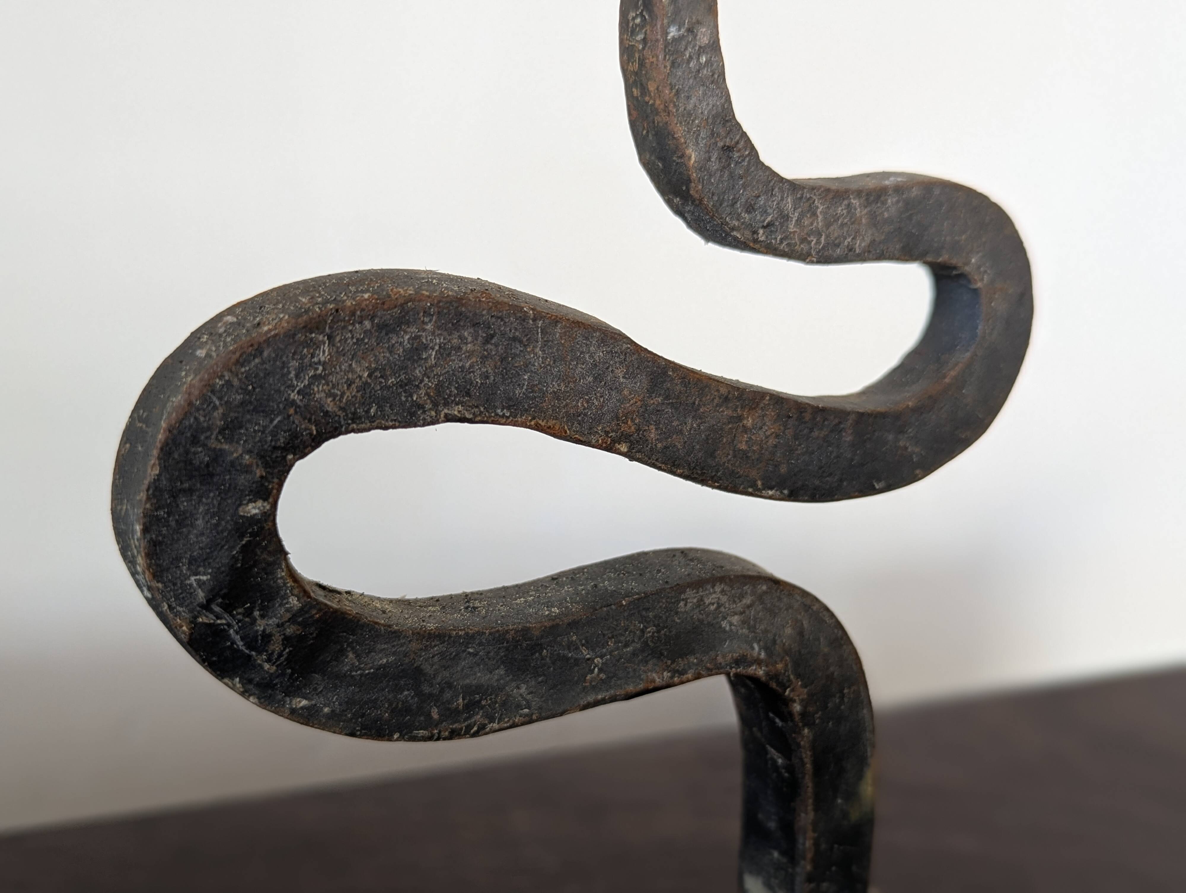 Pair of wrought iron candlesticks