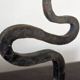 Pair of wrought iron candlesticks