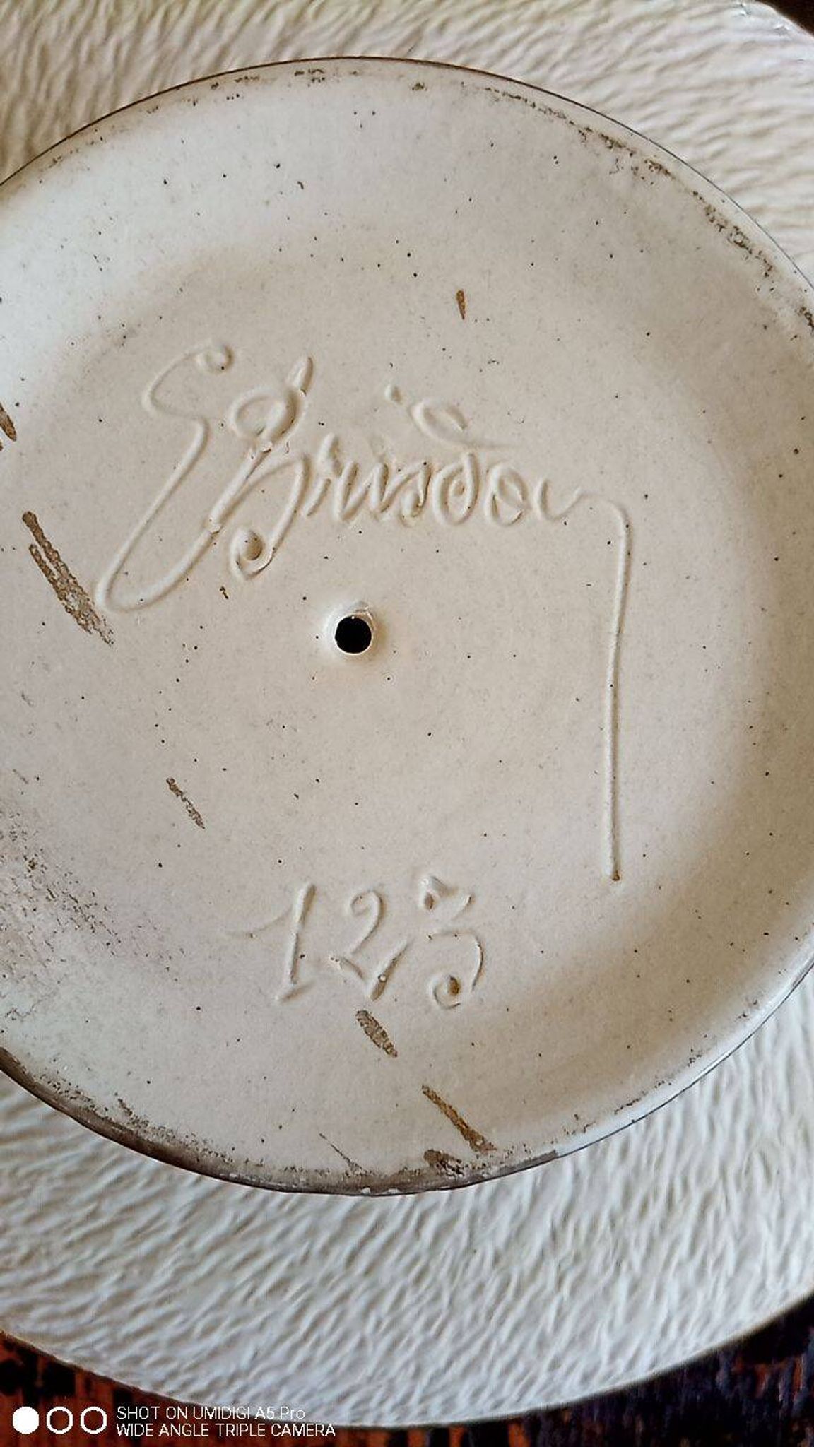 Earthenware fruit bowl - signed and numbered under the base