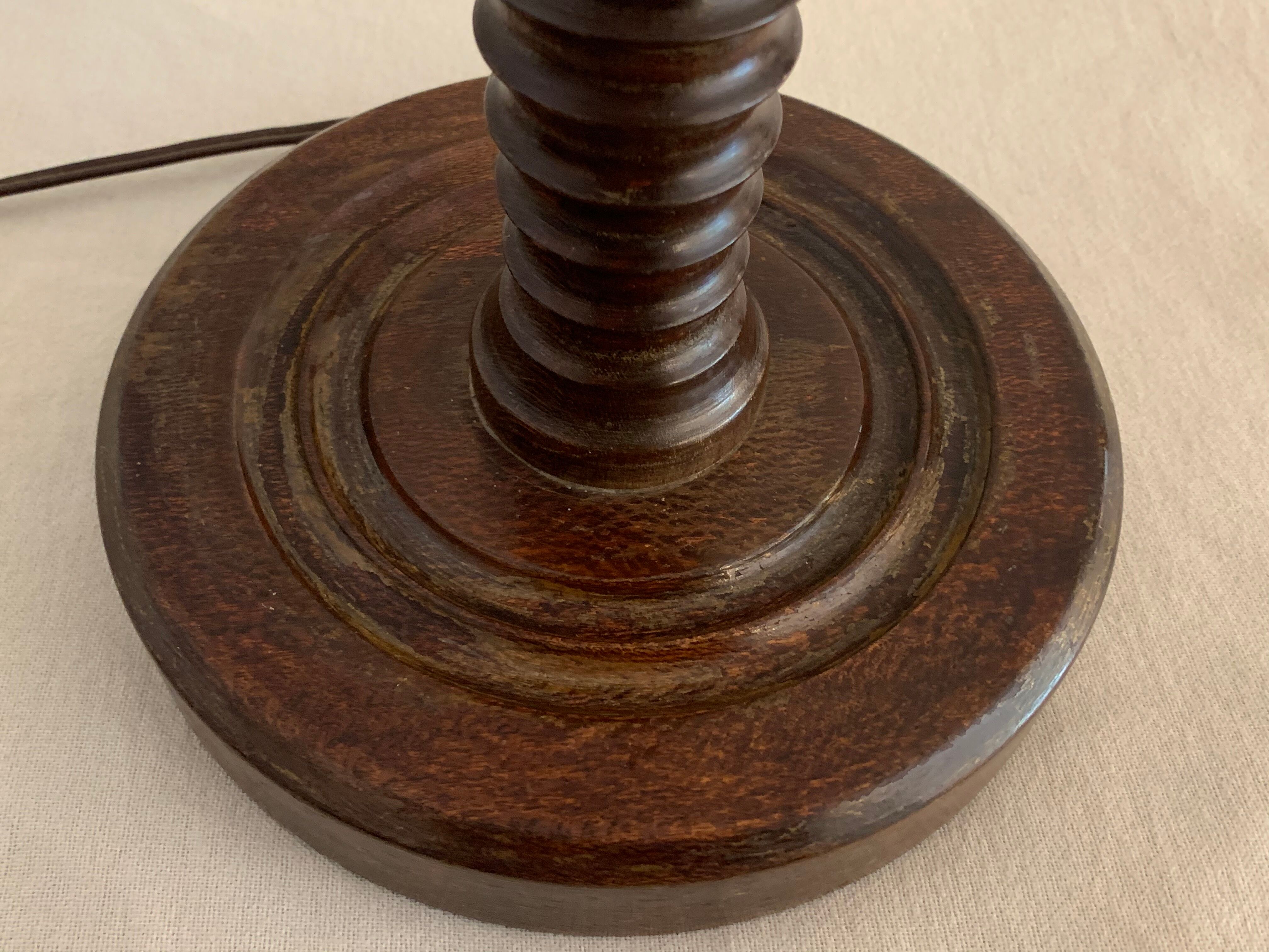 Turned wooden lamp foot in the shape of a warhead