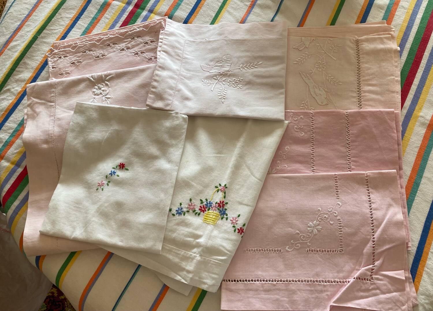 Set of embroidered baby bed sheets