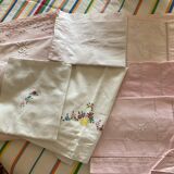 Set of embroidered baby bed sheets