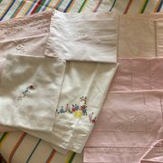 Set of embroidered baby bed sheets