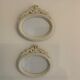2 off-white oval plaster frames