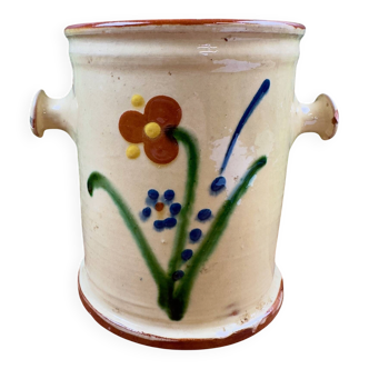 Antique ceramic pot with hand-painted floral decoration.