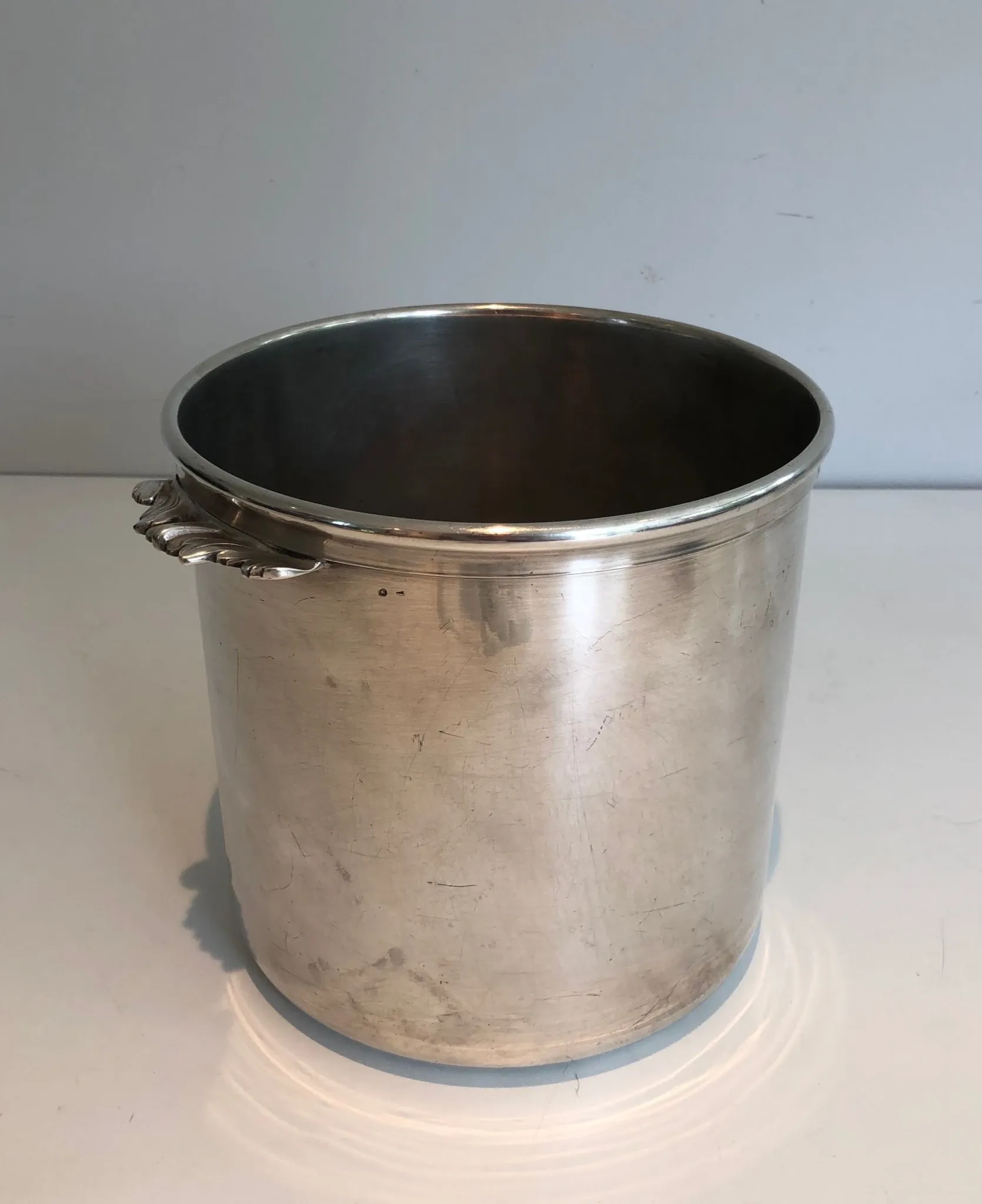 Cylindrical Silver-Plated Champagne Bucket with Small Leaf-Shaped Handles.