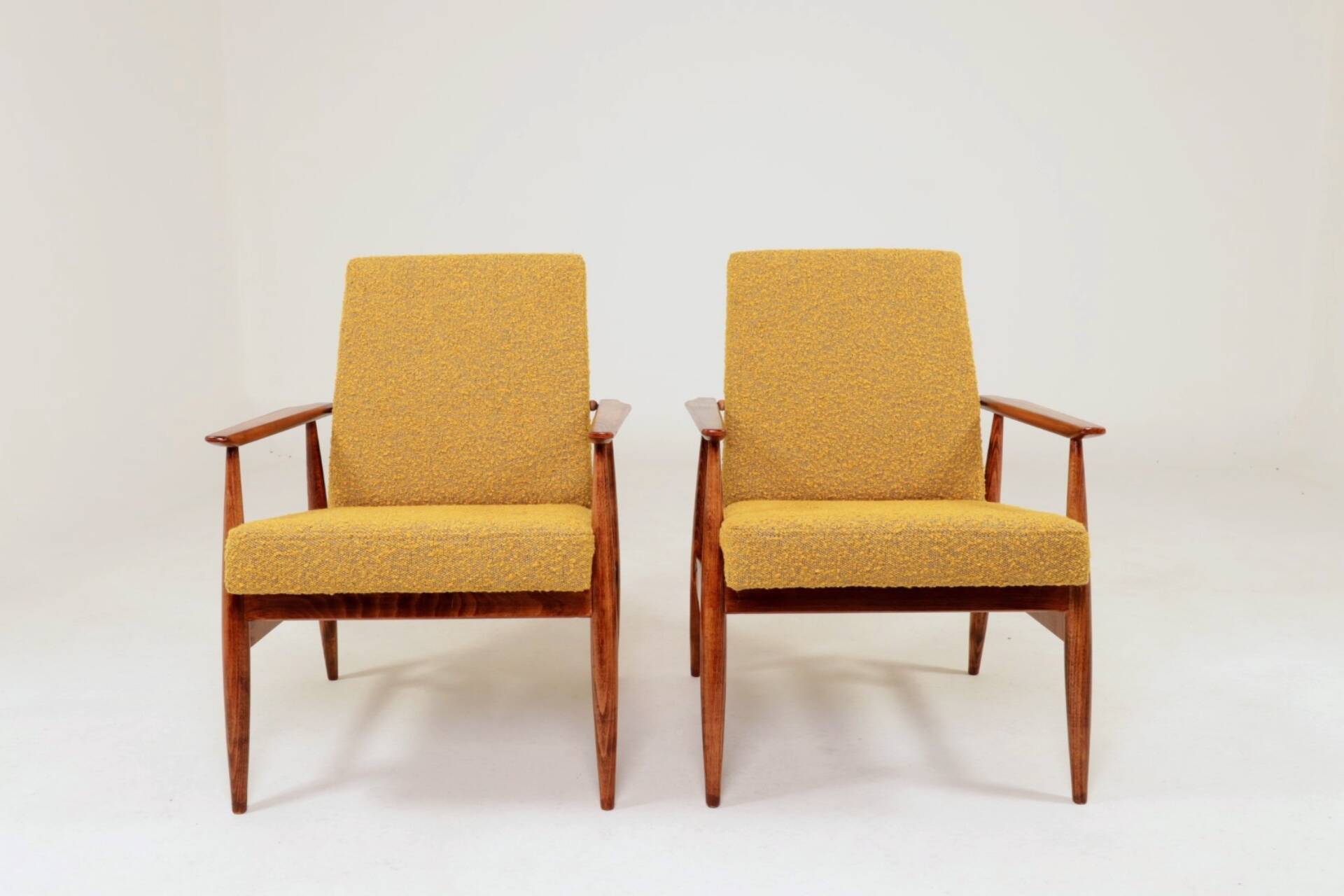Pair of vintage boucle mustard armchairs H.Lis