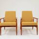 Pair of vintage boucle mustard armchairs H.Lis