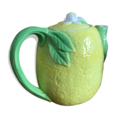 Pouring teapot in dabbling