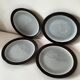 Set of 4 two-tone flat plates with a crackled effect.