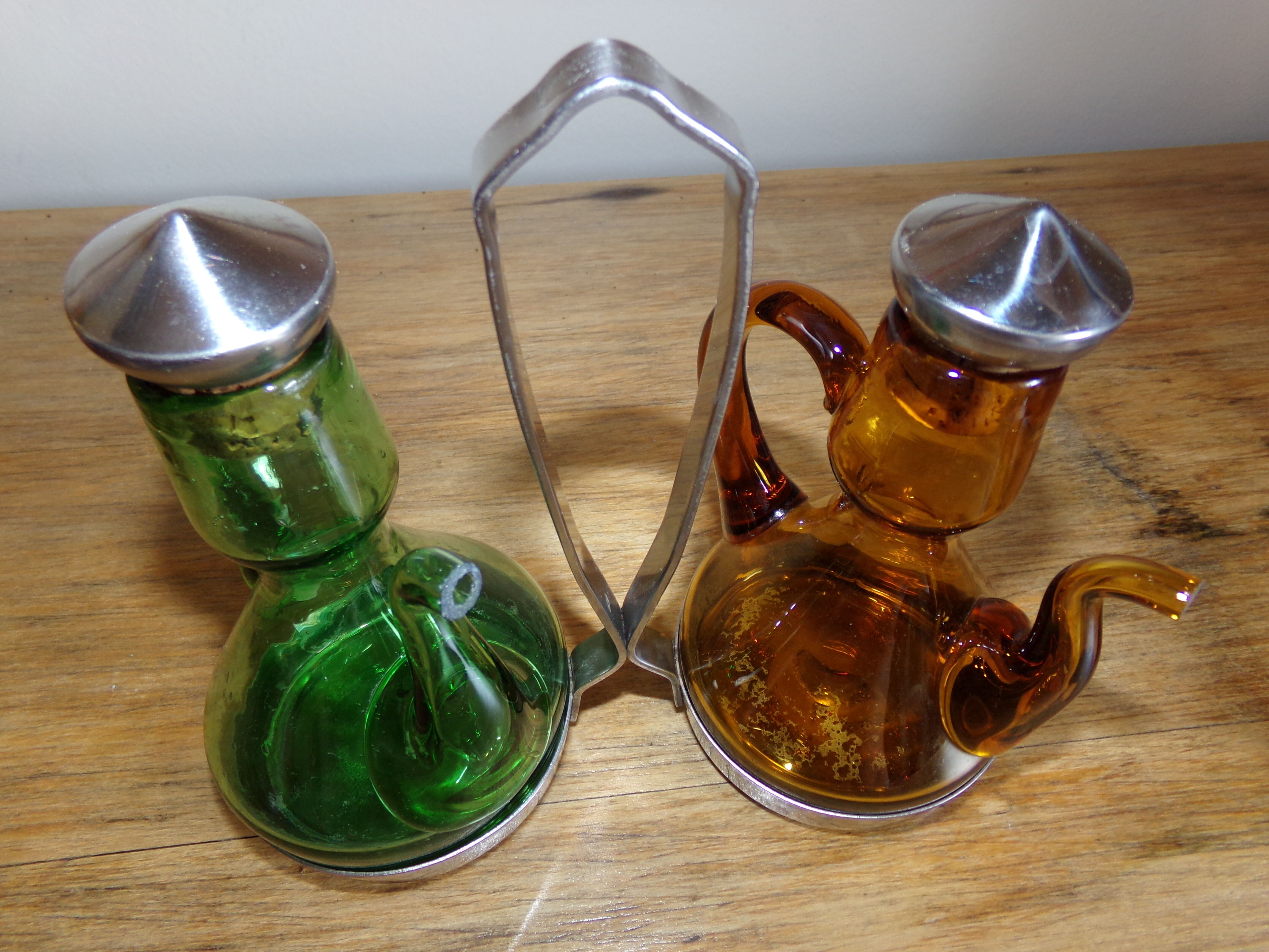 Oil and winery in amber and green sulphur glass