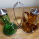 Oil and winery in amber and green sulphur glass