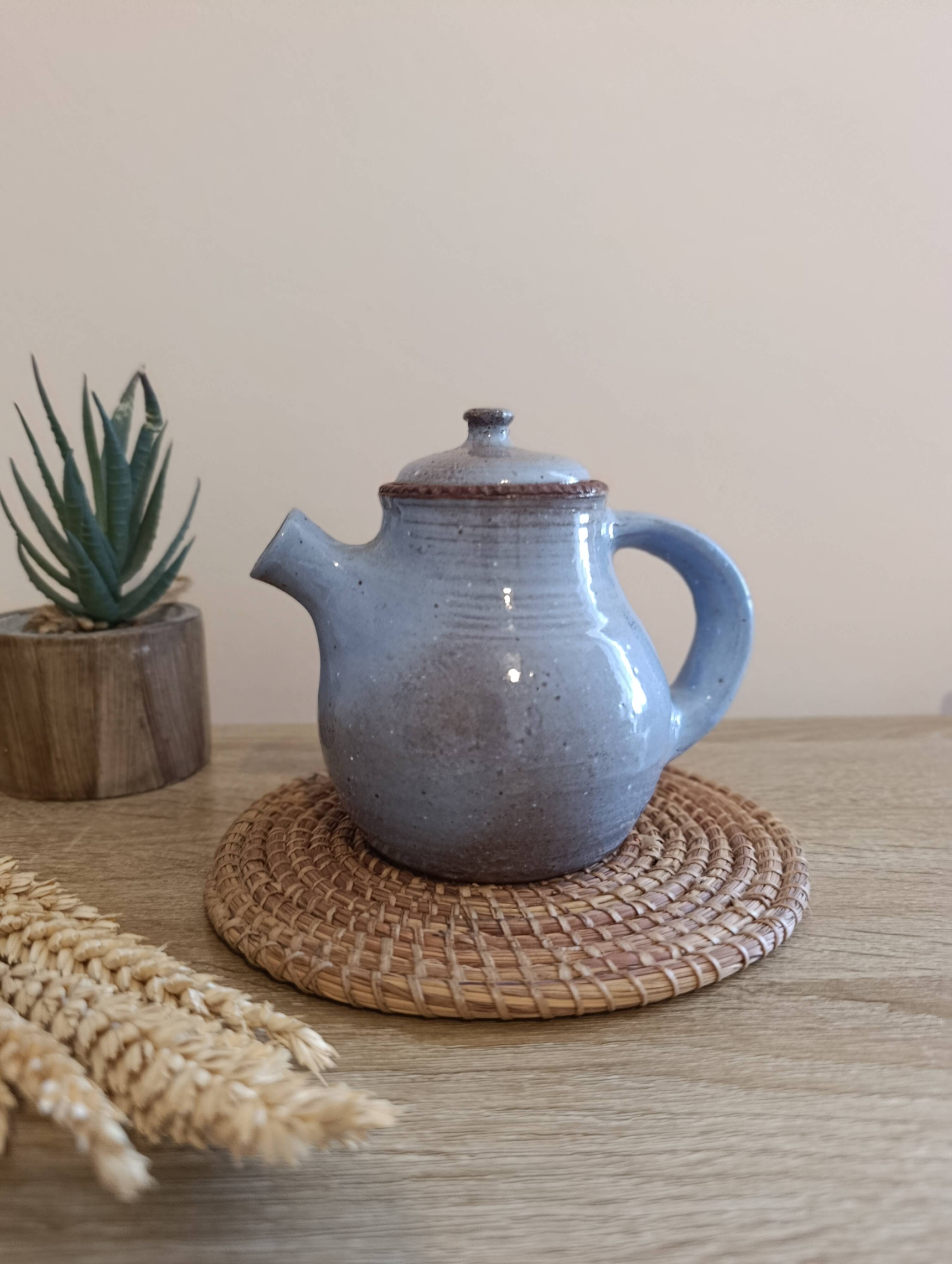 Ceramic teapot in blue/grey glaze, signed by Jeanne and Norbert Pierlot.