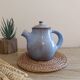 Ceramic teapot in blue/grey glaze, signed by Jeanne and Norbert Pierlot.