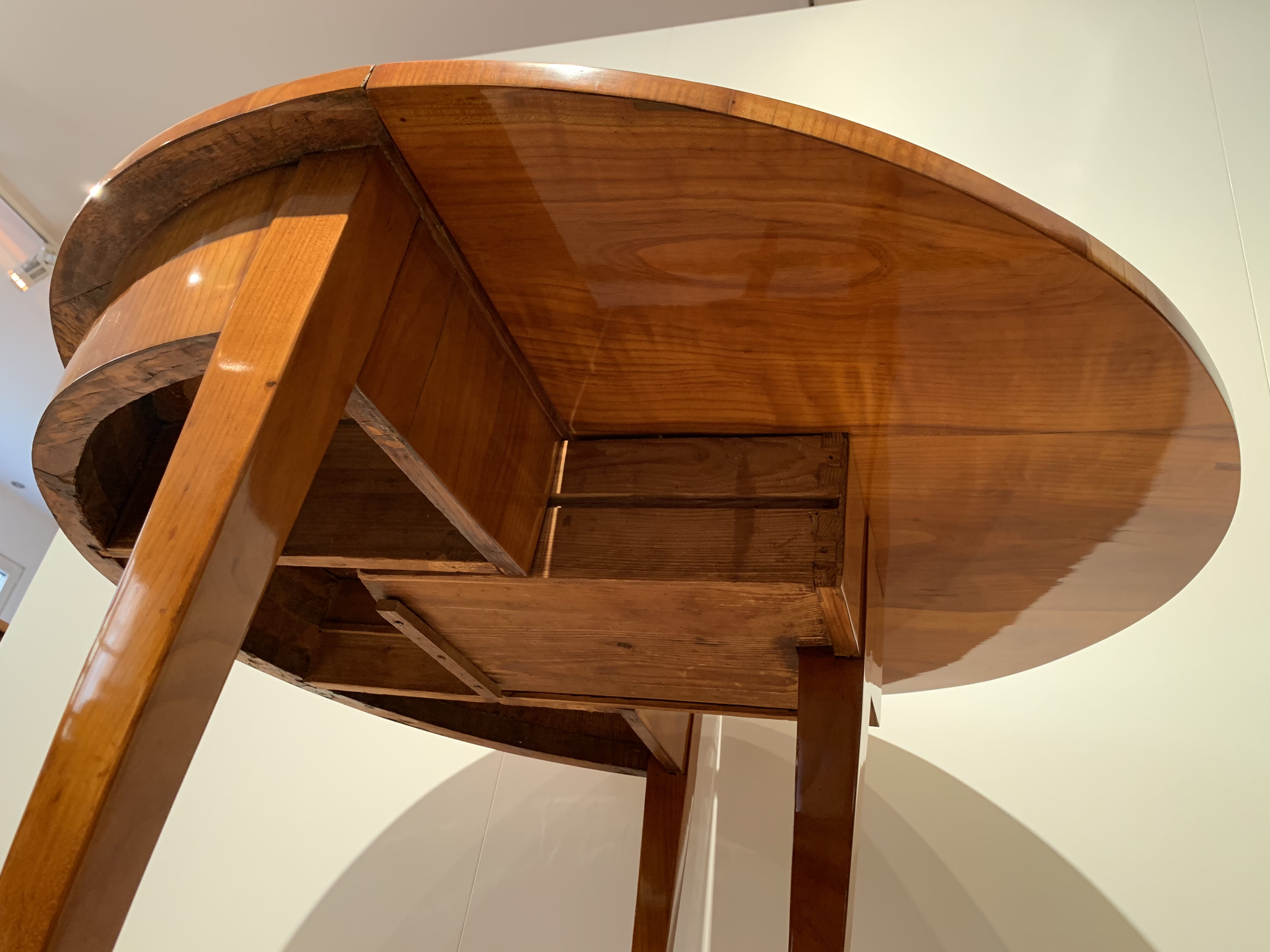 Biedermeier demi-lune fold-out table, cherry veneer, south germany, circa 1820