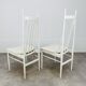 2 Scandinavian chairs with white bars from the 60s