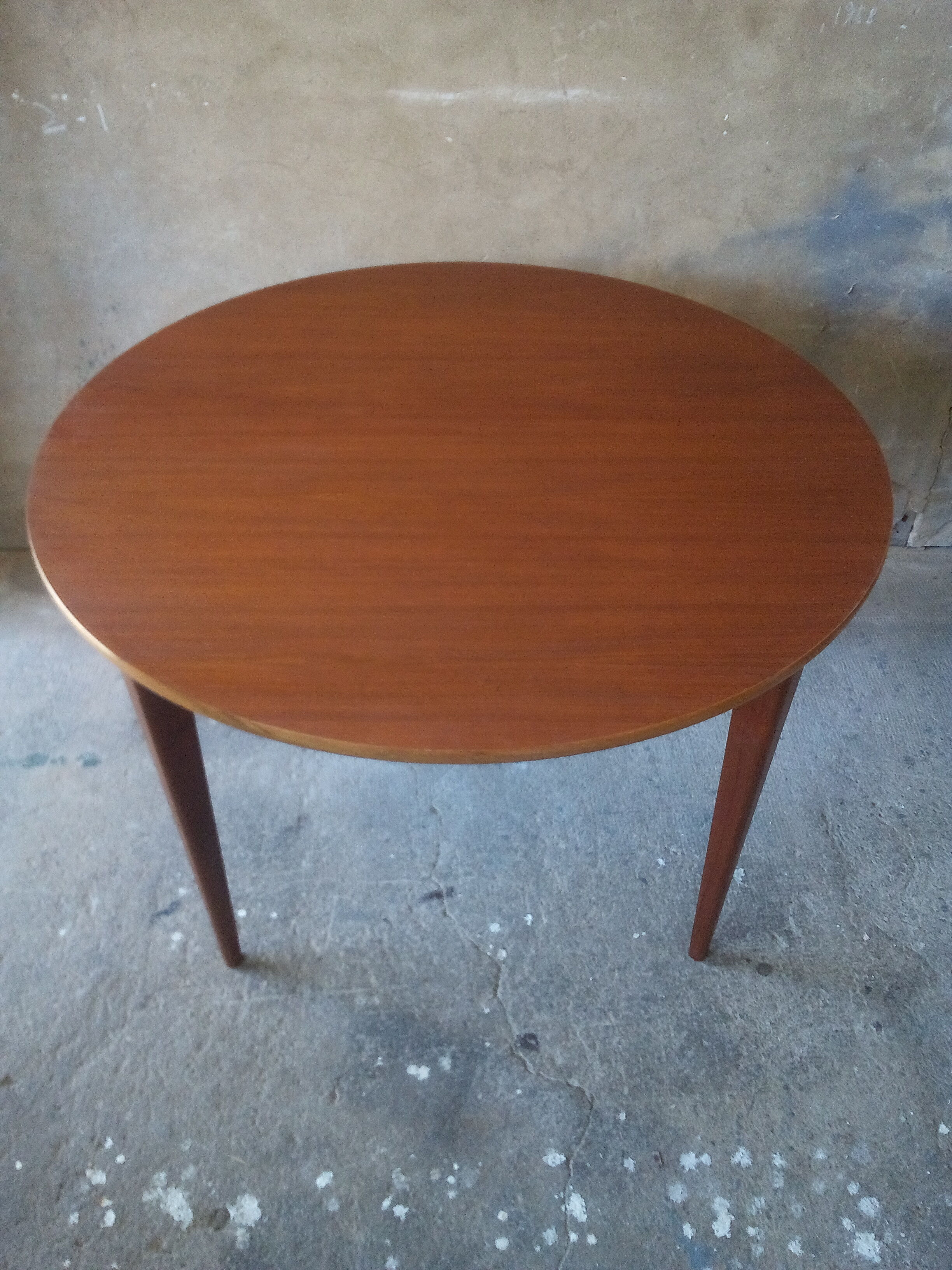 Circular teak table