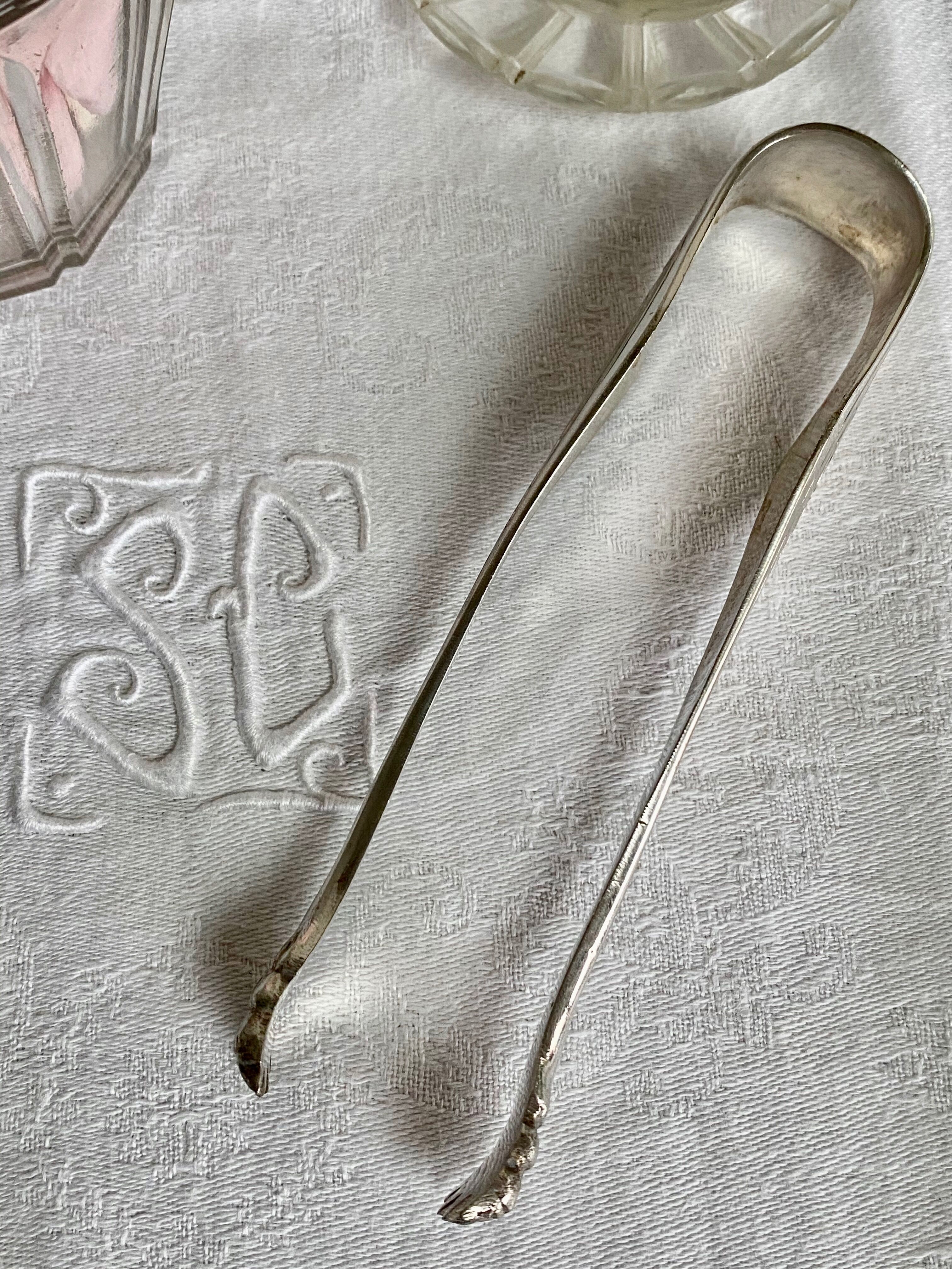 Silver metal sugar tongs