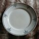 Old round plate made of ironstone