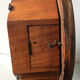 Antique mahogany wall bracket with glass lid