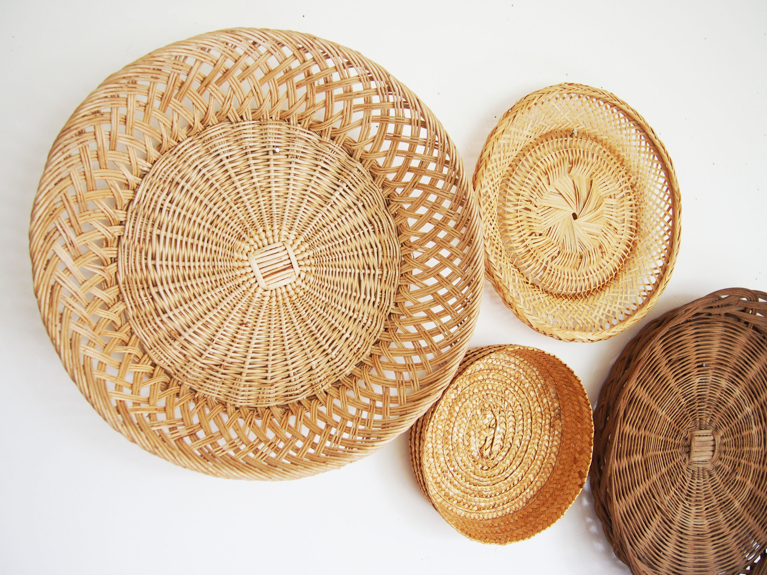 Wall composition of 7 wicker baskets