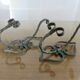 Pair of green lacquered wrought iron wall hooks, art deco, 1930s 40s