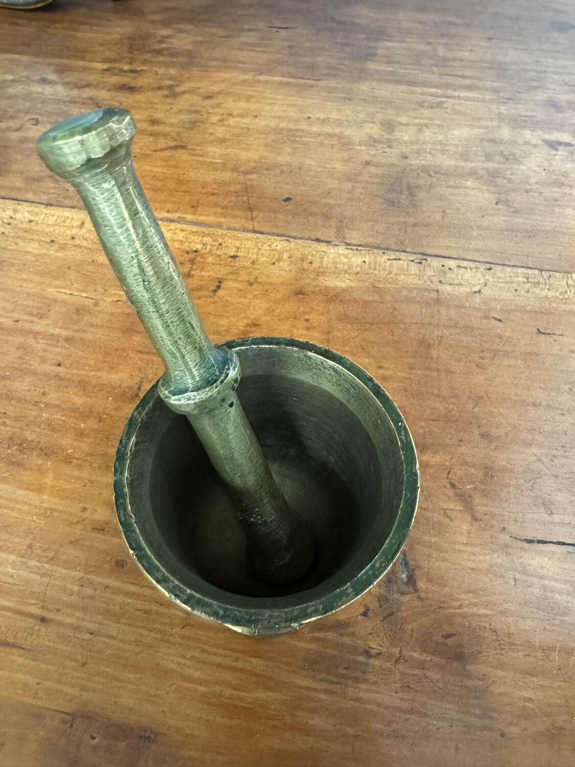 Golden brass mortar and pestle