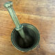 Golden brass mortar and pestle