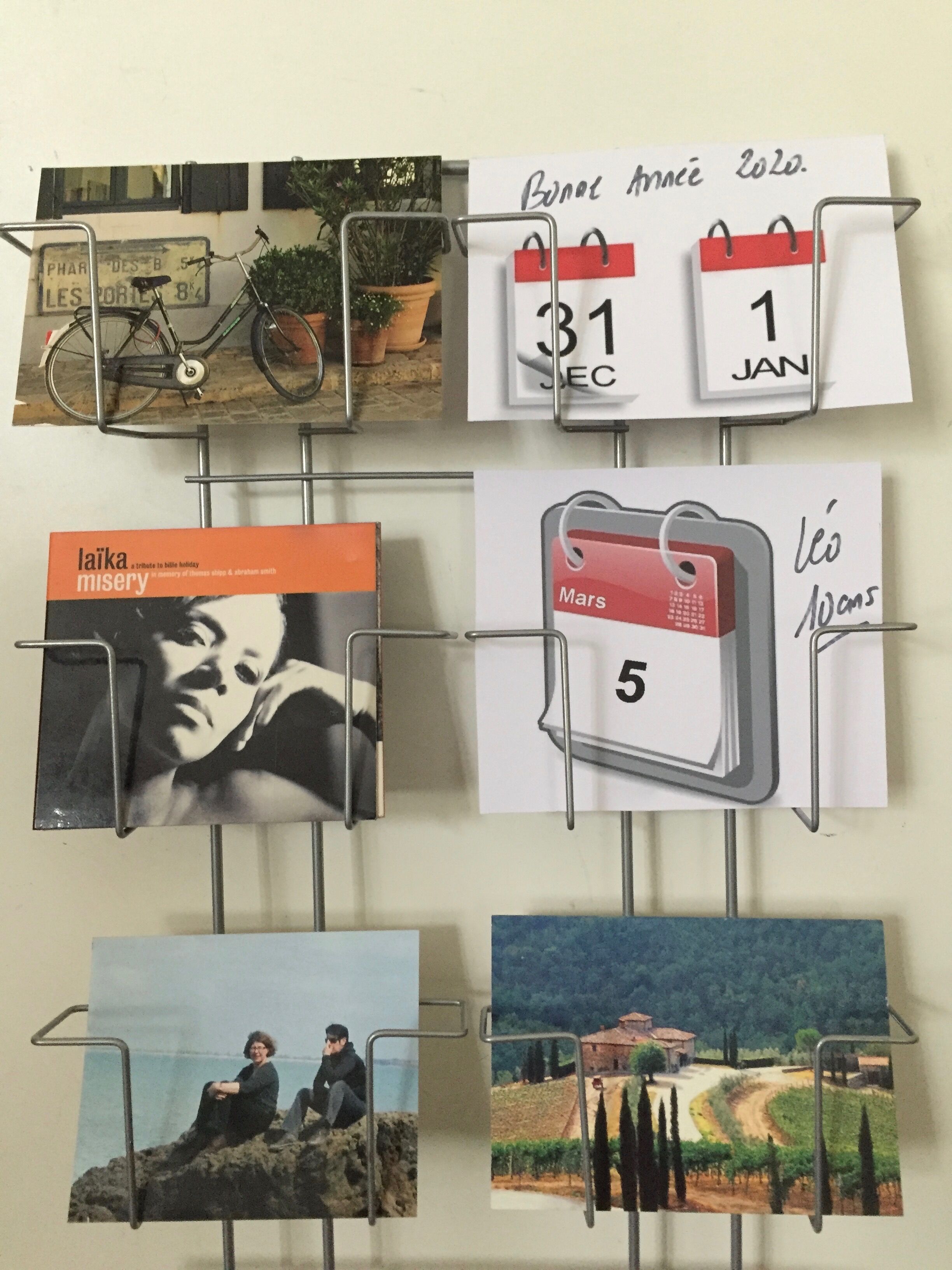 Double display for postcards, photos, books and CDs
