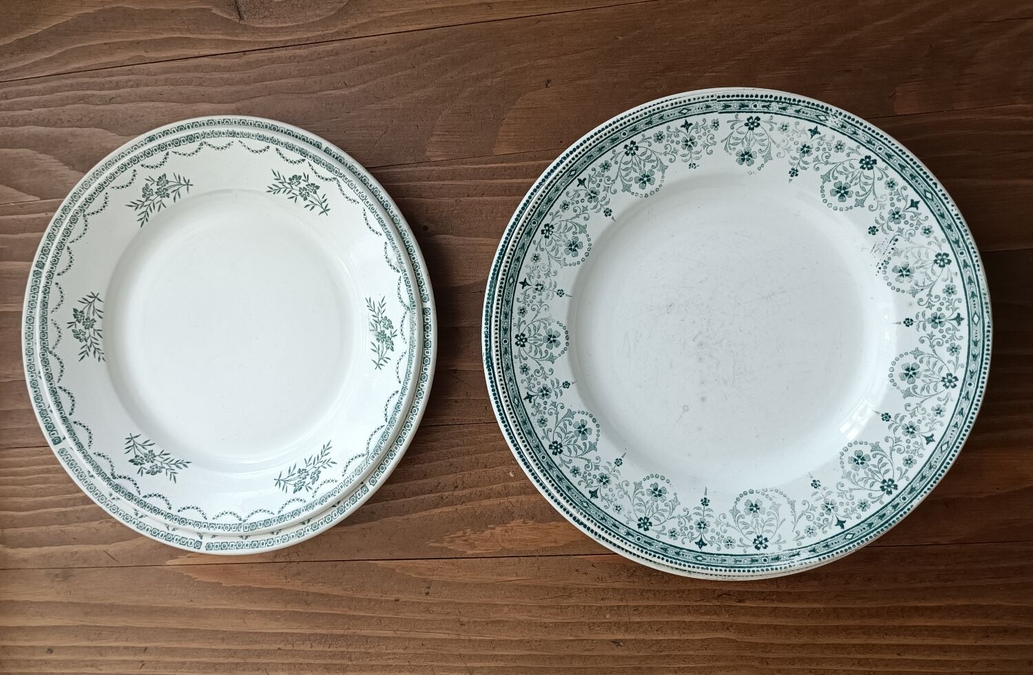 Set of 4 mismatched iron earth plates