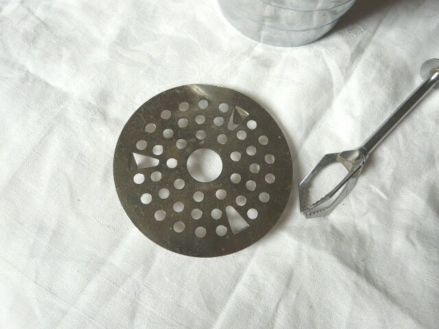 Ice in chromed metal and macassar ebony and pliers bucket