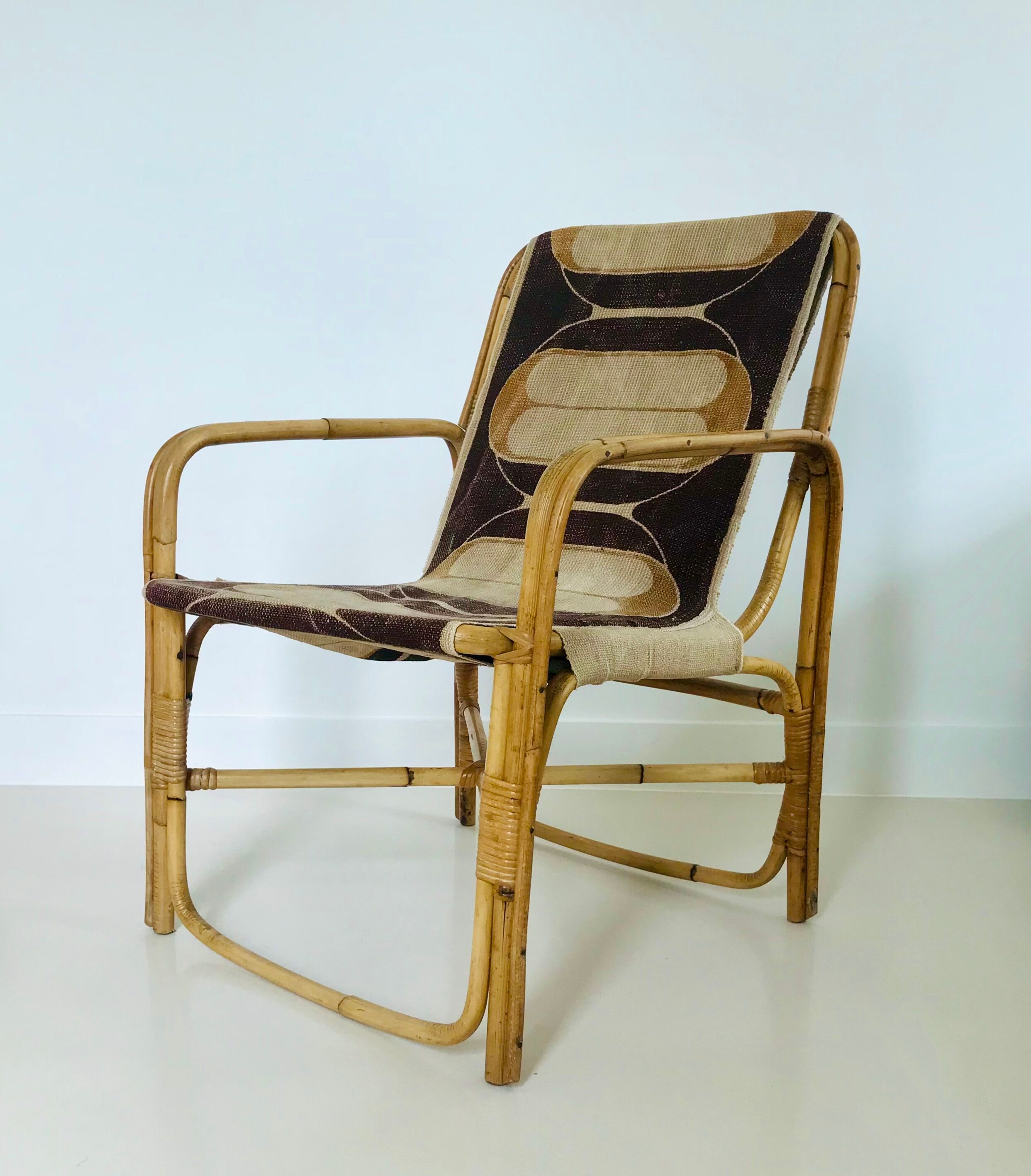 Rattan armchair and fabric, France 60s