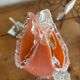 Pink opaline vase with added fruits