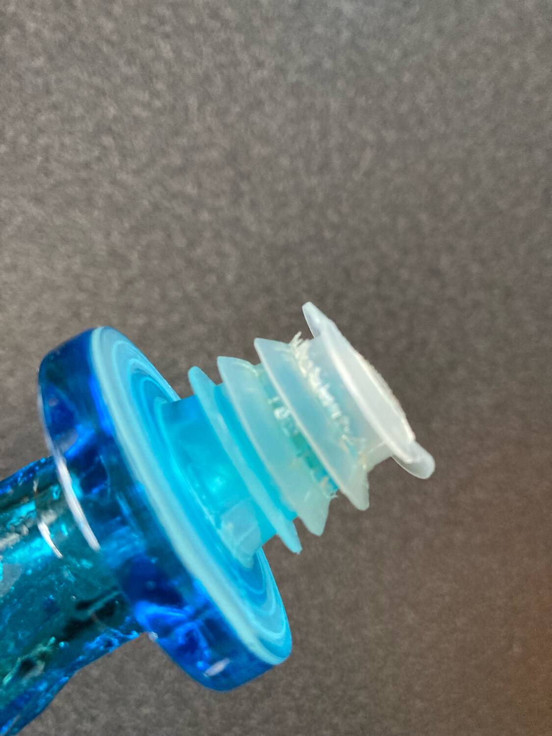 Blue chiseled glass bottle