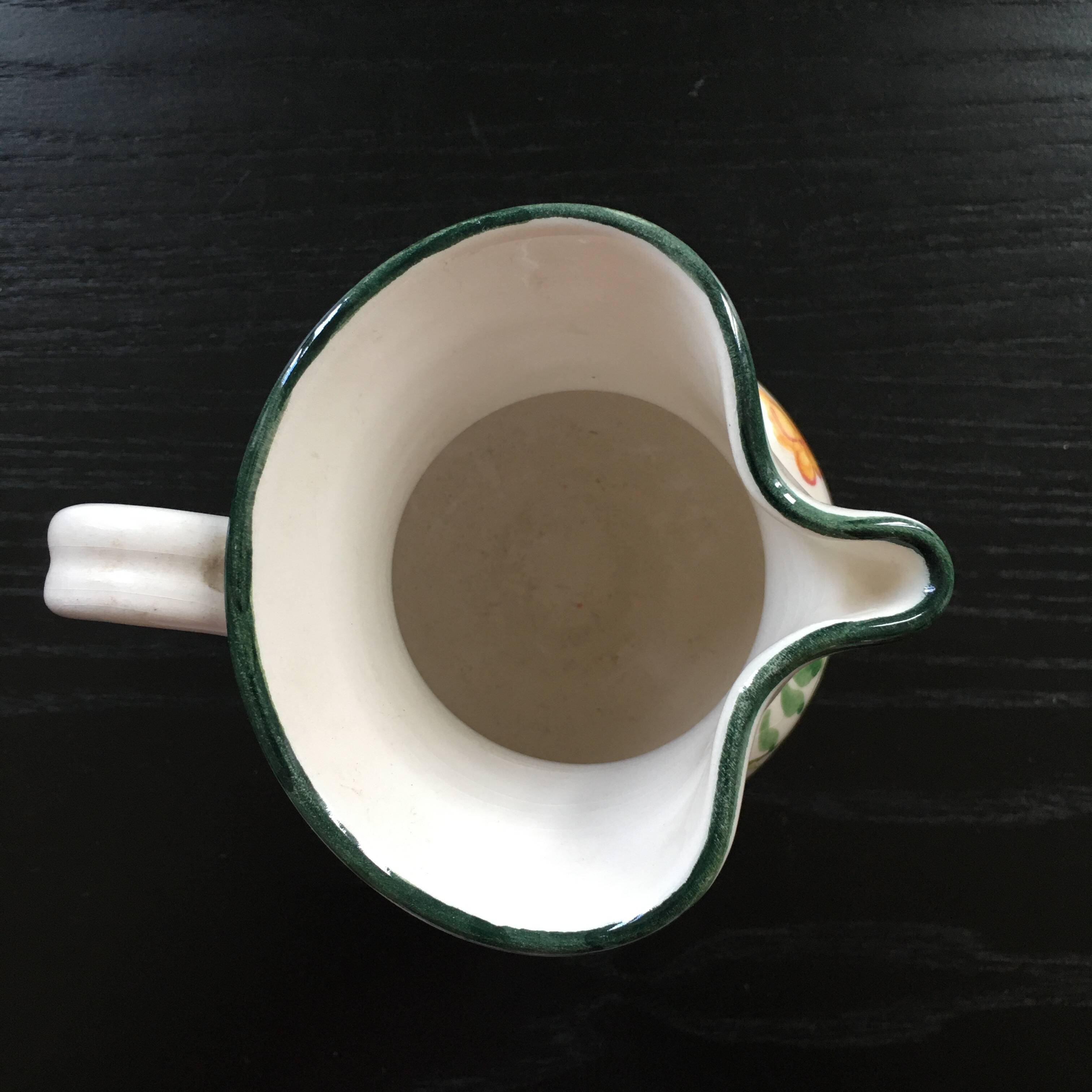 Small pitcher with floral decoration