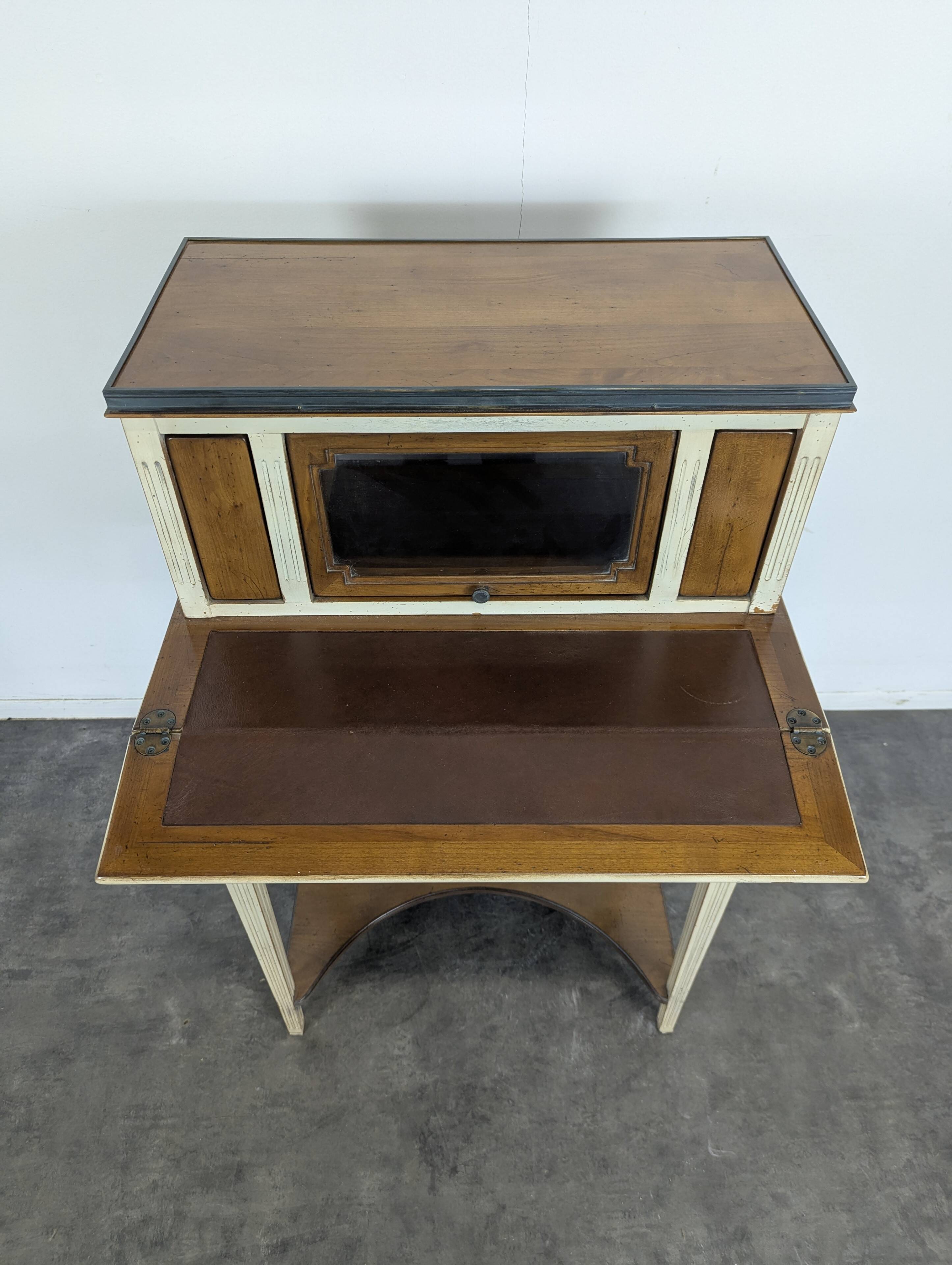 Lady Bonheur's desk, cerused and neo-rustic with highlights.