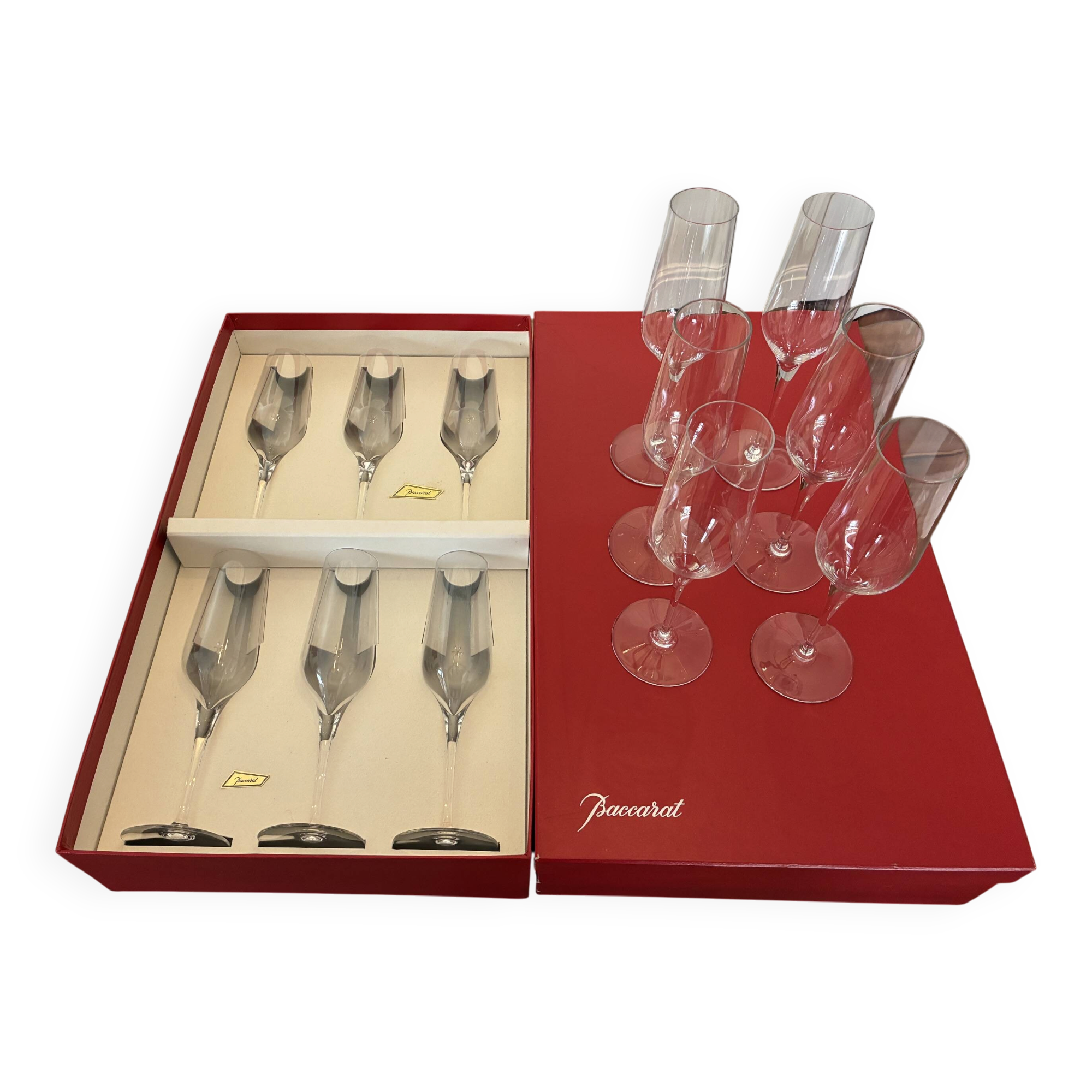 2 sets of 6 Baccarat Grand Siècle flutes. Never used.