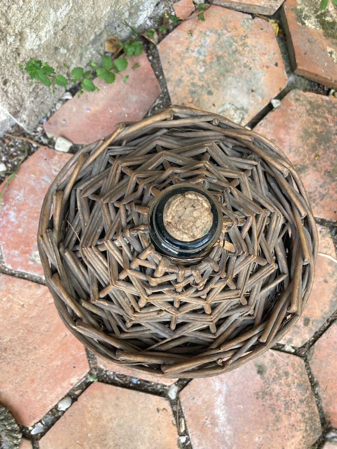 Vintage wicker demijohn