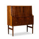Rosewood chest of drawers with 2 drawers, forming a secretary. 1970s.