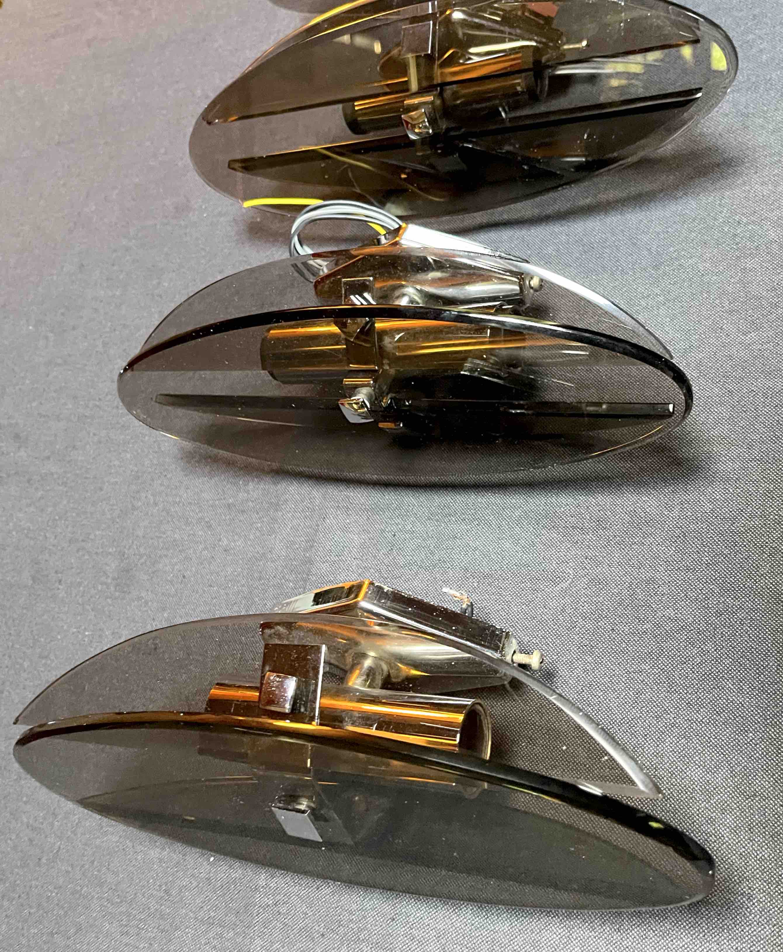 Four Veca wall lights, smoked glass, double light, Italy 1970's