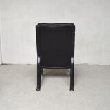 Black leather armchair and canning