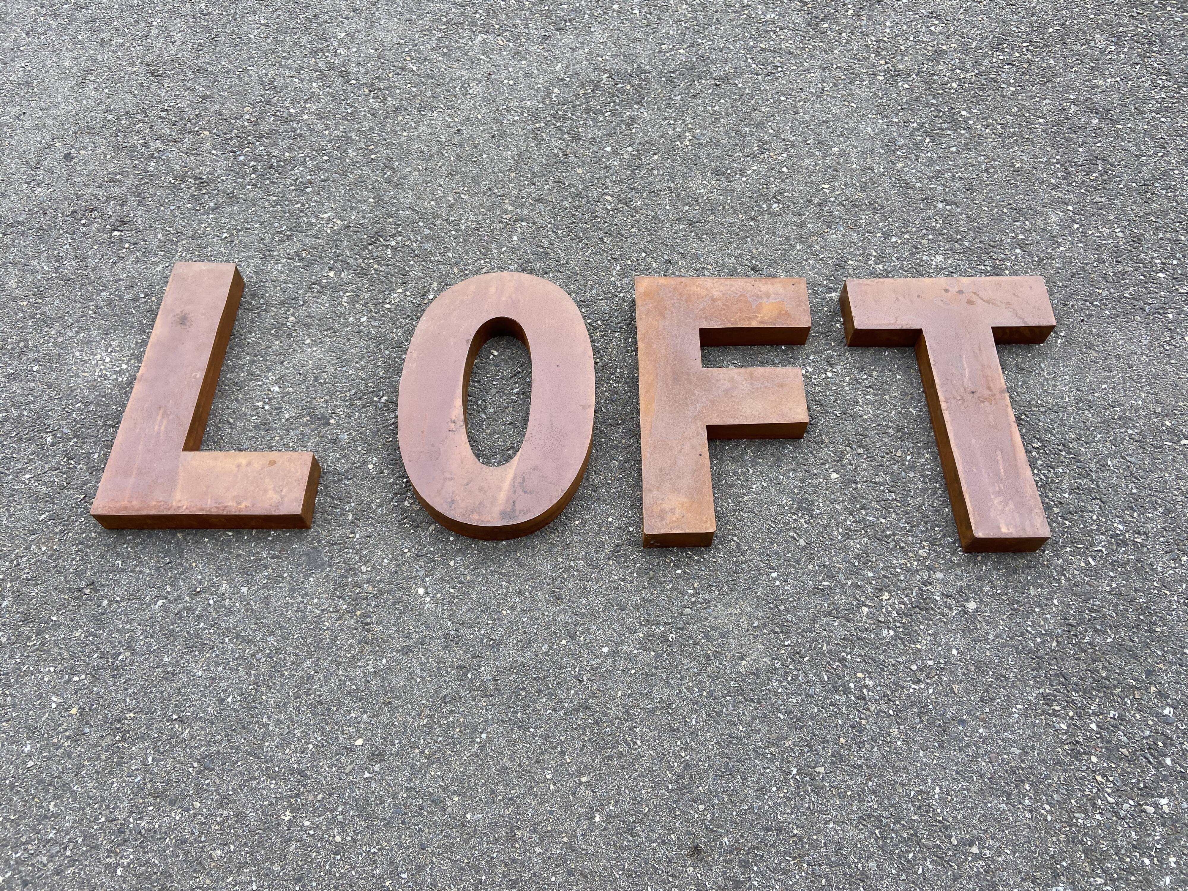 LOFT sign in vintage metal letters