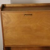Vintage 1960s wooden secretary with metal legs.