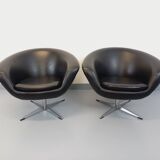 Pair of vintage Scandinavian swivel armchairs in faux leather and chrome.