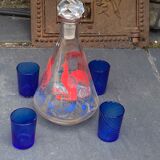 Peacock pattern liqueur decanter and 4 small vintage cobalt blue glasses