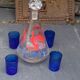 Peacock pattern liqueur decanter and 4 small vintage cobalt blue glasses