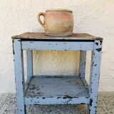 Patinated wood side table